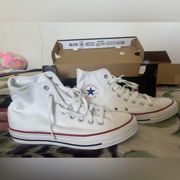 Converse Shoes - Newly never worn white converse!
Status: never worn
Size: 8.5(W)/6.5(M)